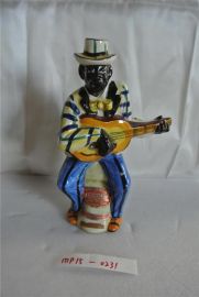 Vintage Drioli Bottle New Orleans Guitar Player